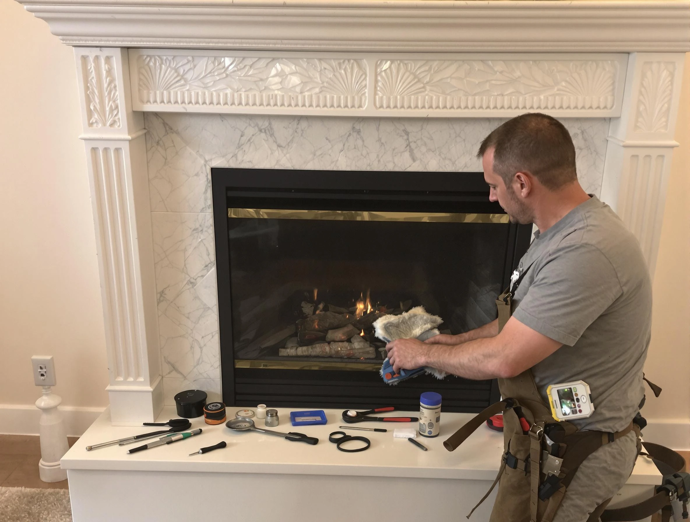 Fayetteville Chimney Sweep performing fireplace maintenance in Fayetteville, GA